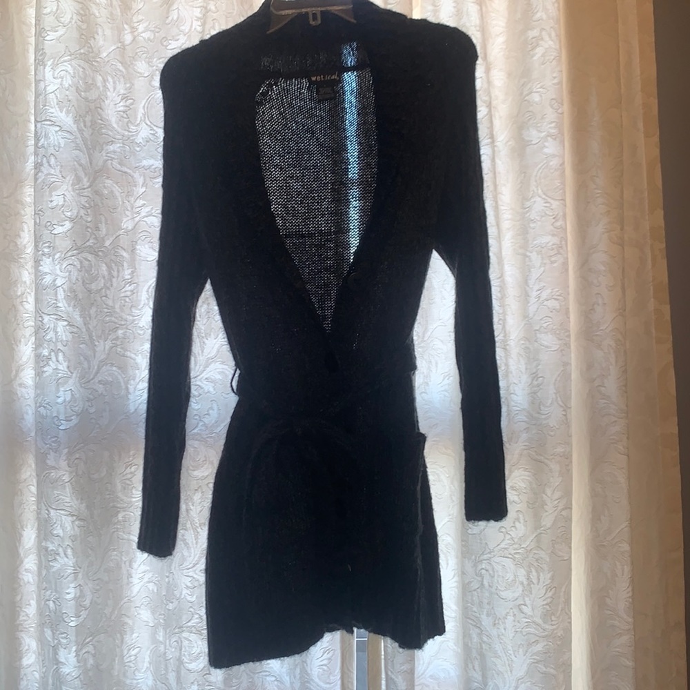 Long button and tie sweater